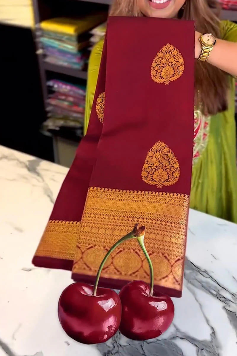 Pleasing Wine Soft Banarasi Silk Saree With Pretty Blouse Piece