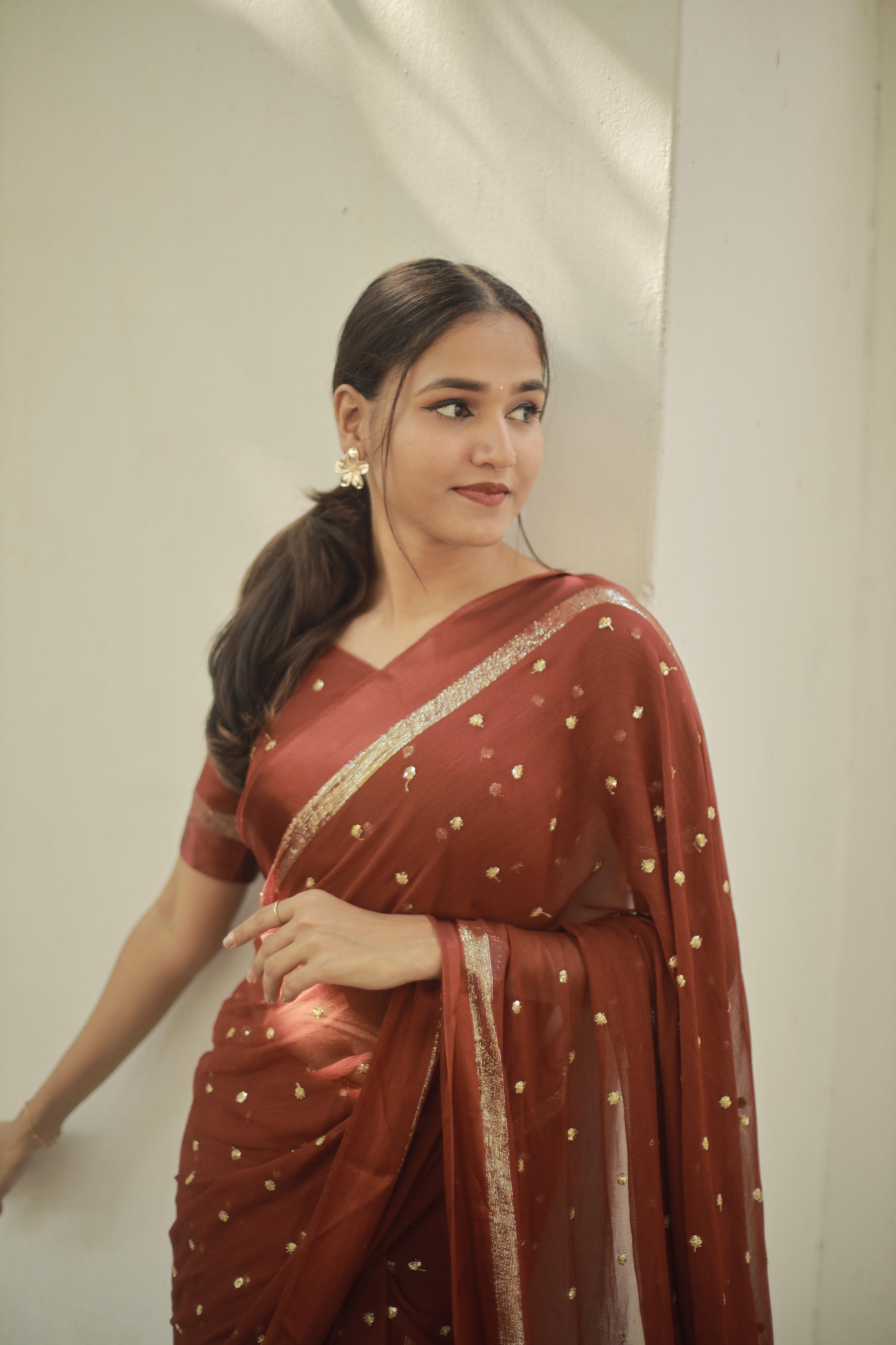 Most Trending Viral Pure Viscose Georgette Festival Rust Color Saree With Satin Border
