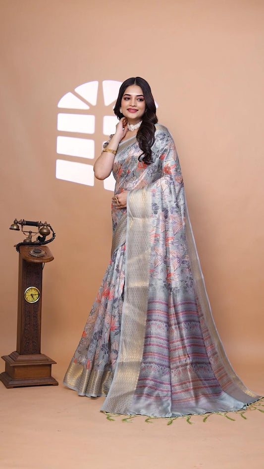 Graceful Soft Silk Saree with Floral Print And Zari Border