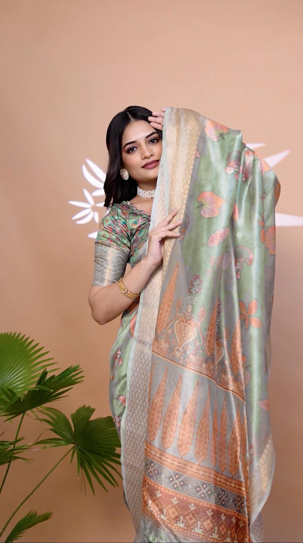 Good-looking Sage Green Soft Silk Saree with Floral Print & Zari Border