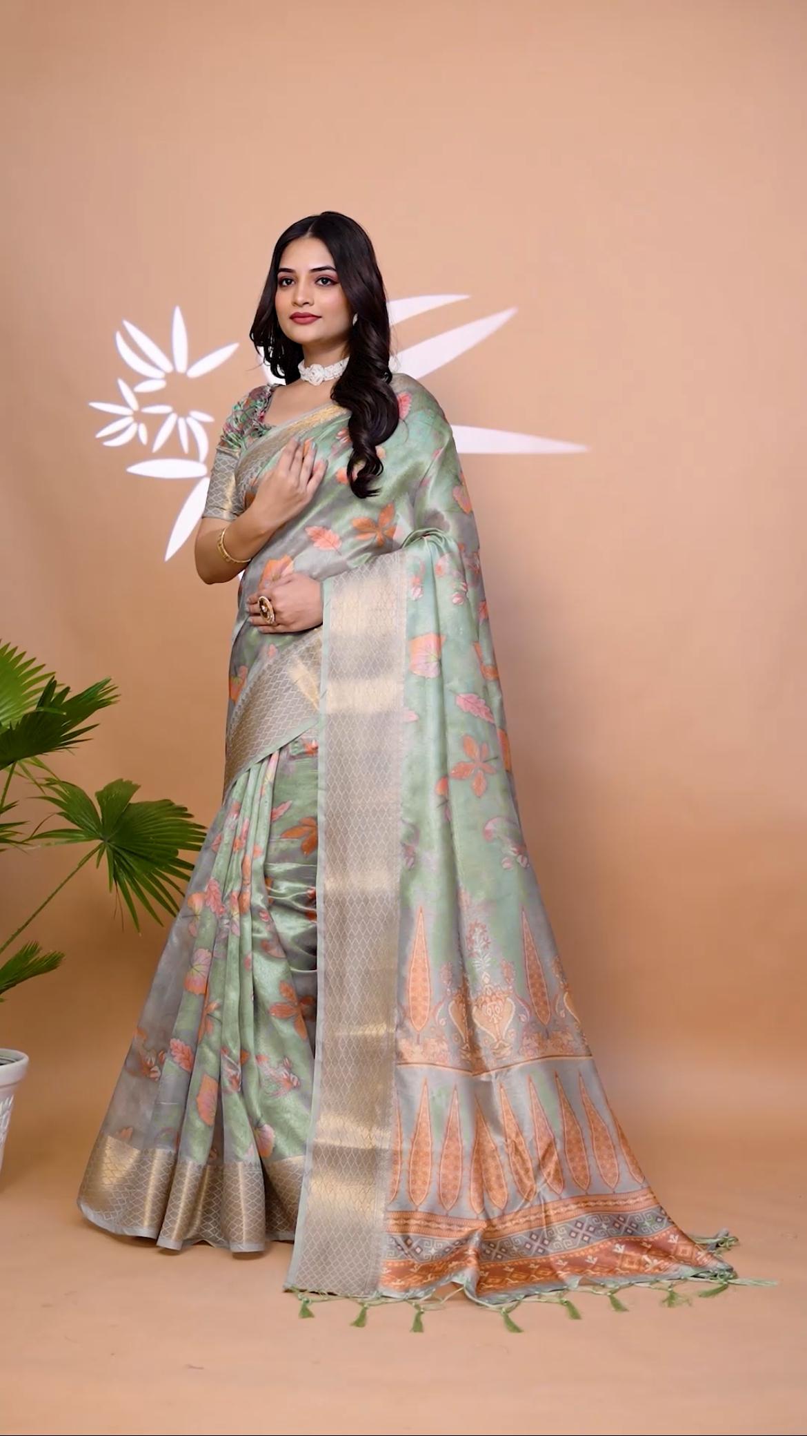 Good-looking Sage Green Soft Silk Saree with Floral Print & Zari Border