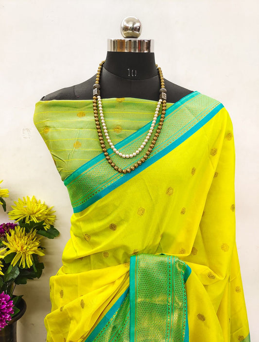 Attractive Zari Weaving Paithani Silk Saree With Tassels