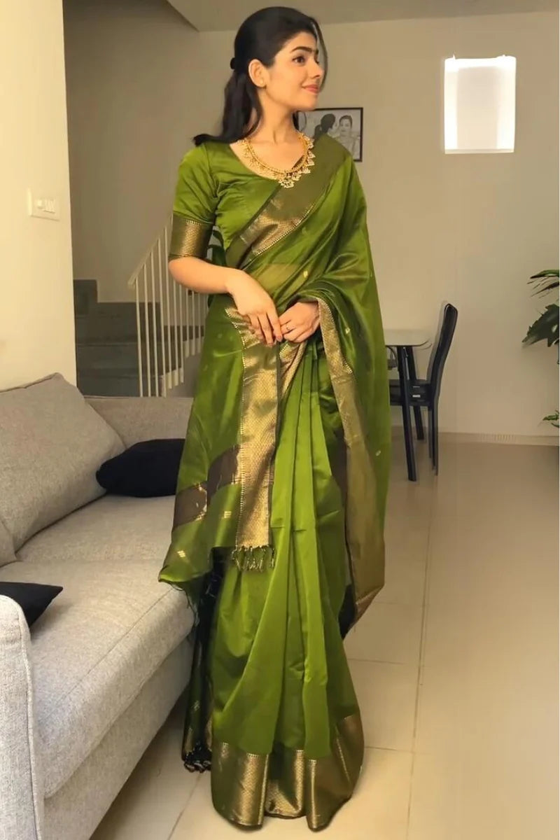 Charming Green Cotton Silk Saree With Beautiful Blouse Piece