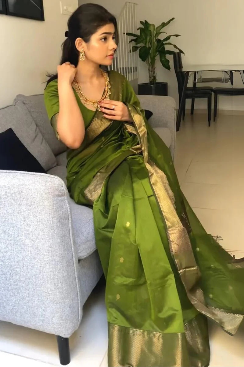 Charming Green Cotton Silk Saree With Beautiful Blouse Piece