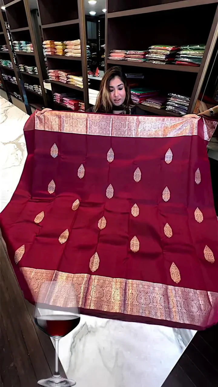 Delightful Wine Soft Banarasi Silk Saree With Blouse Piece