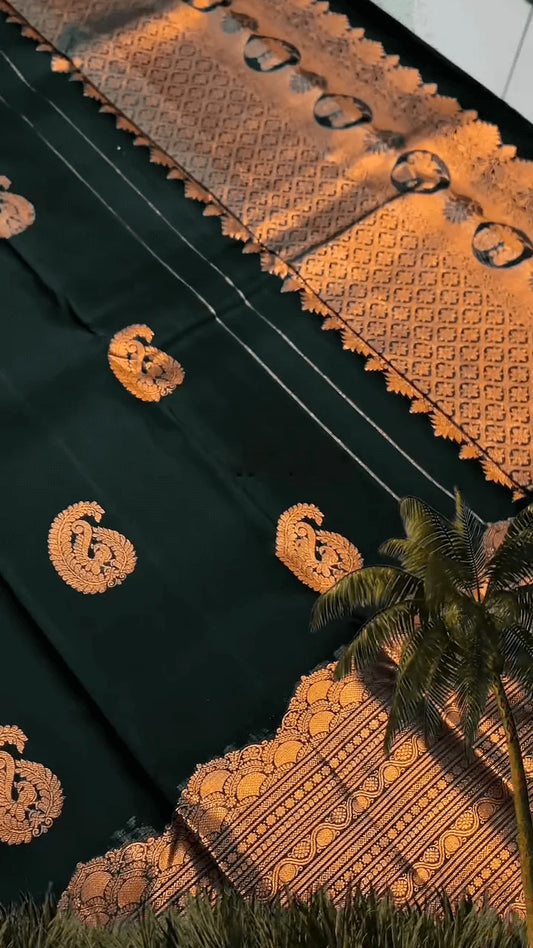 Very Engaging Dark Green Soft Banarasi Silk Saree With Gorgeous Blouse Piece