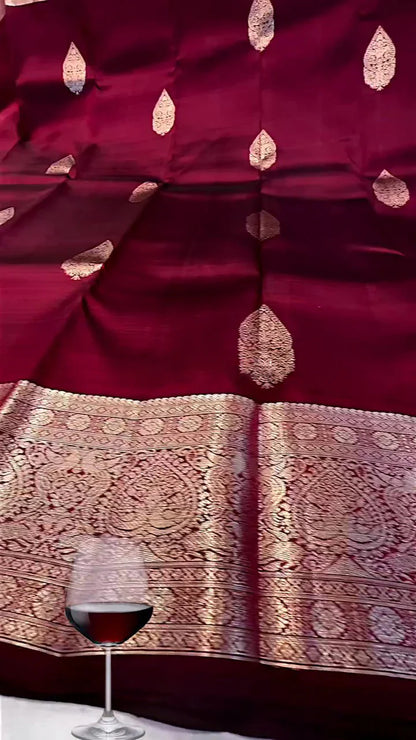 Delightful Wine Soft Banarasi Silk Saree With Blouse Piece
