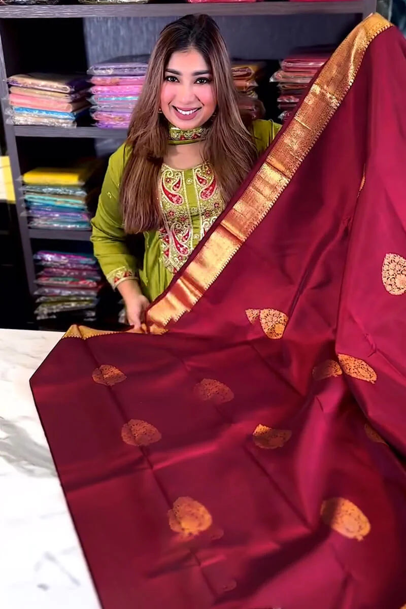Pleasing Wine Soft Banarasi Silk Saree With Pretty Blouse Piece