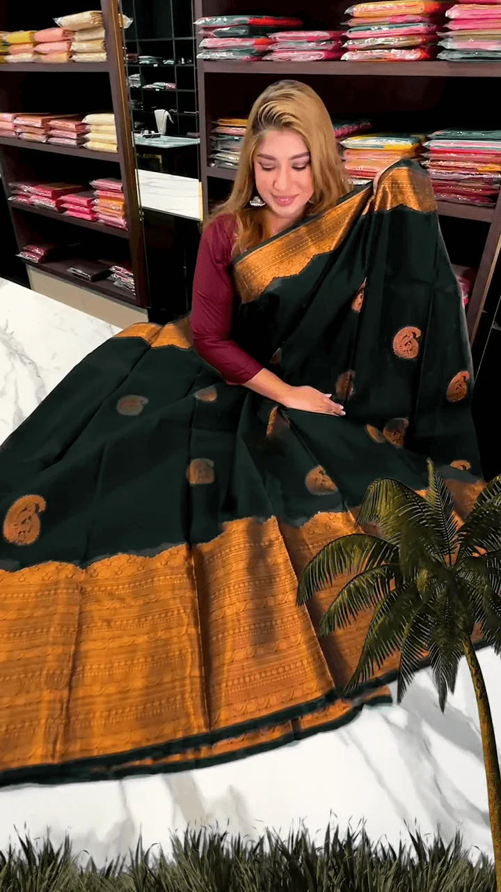 Very Engaging Dark Green Soft Banarasi Silk Saree With Gorgeous Blouse Piece