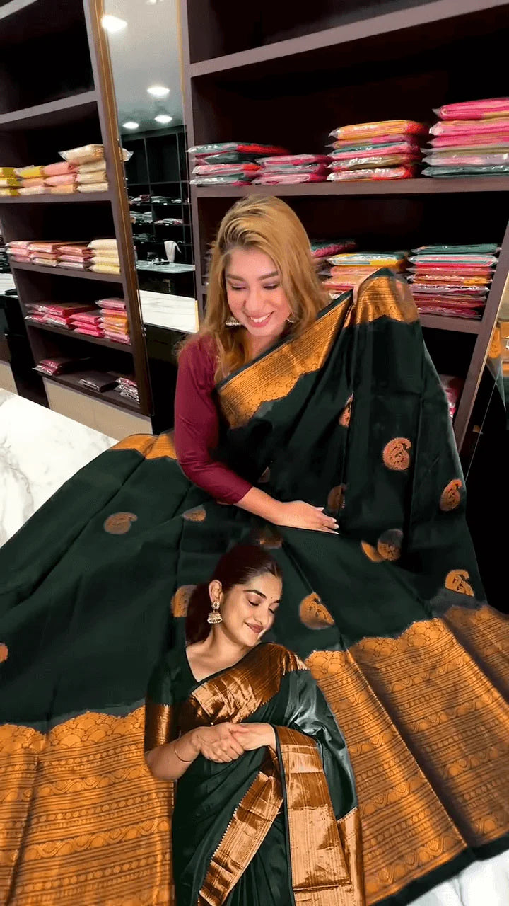 Very Engaging Dark Green Soft Banarasi Silk Saree With Gorgeous Blouse Piece