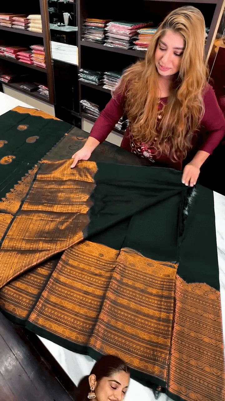 Very Engaging Dark Green Soft Banarasi Silk Saree With Gorgeous Blouse Piece