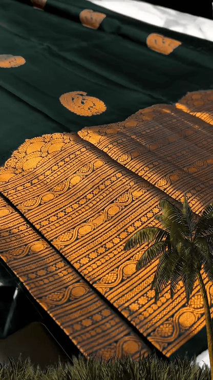 Very Engaging Dark Green Soft Banarasi Silk Saree With Gorgeous Blouse Piece