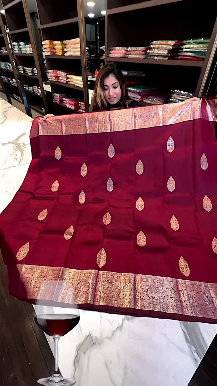 Delightful Wine Soft Banarasi Silk Saree With Blouse Piece