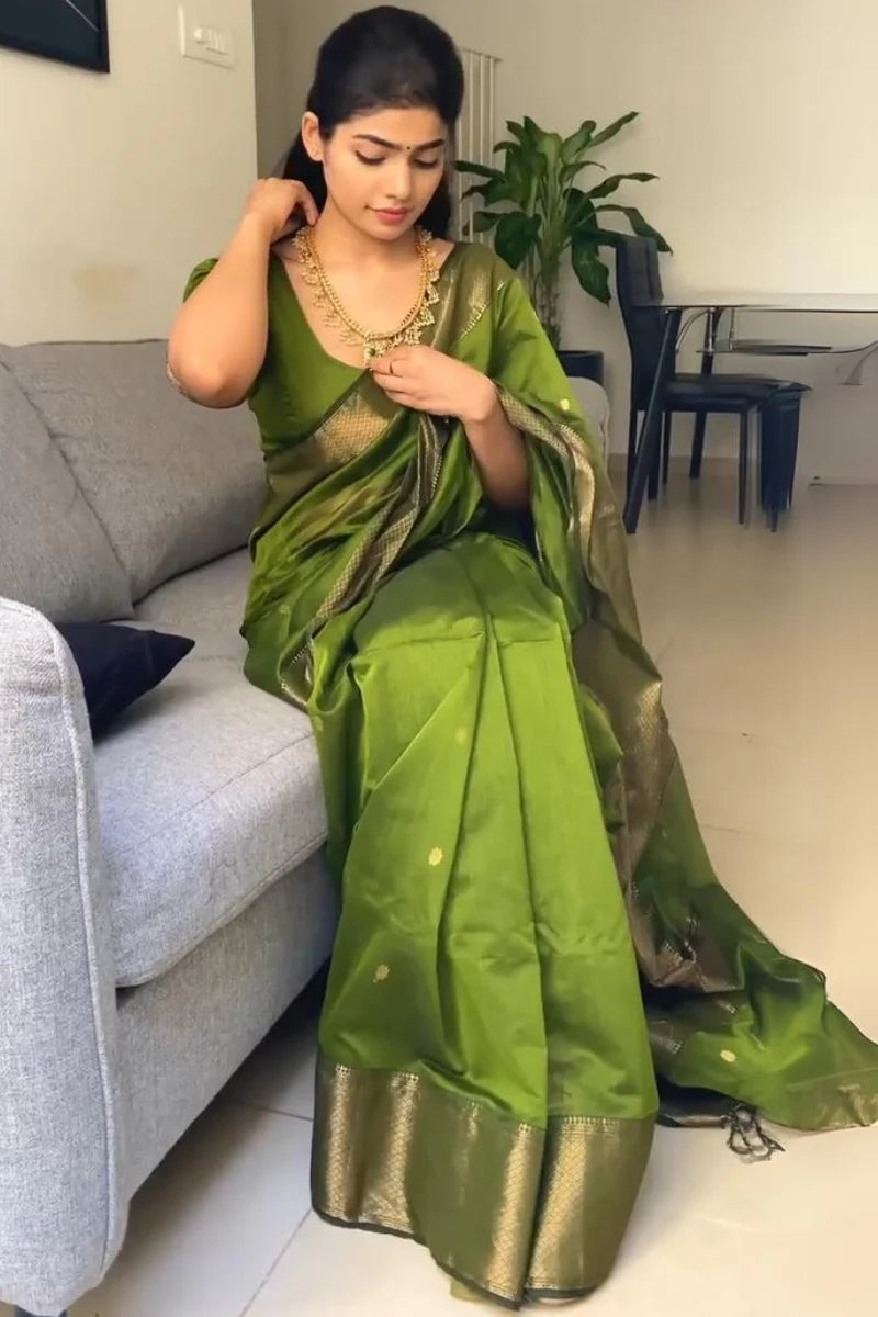 Charming Green Cotton Silk Saree With Beautiful Blouse Piece