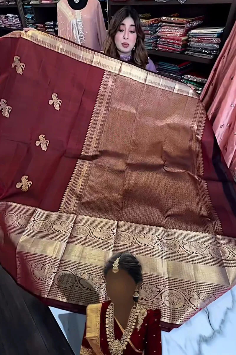 Very Alluring Wine Soft Banarasi Silk Saree With Pretty Blouse Piece