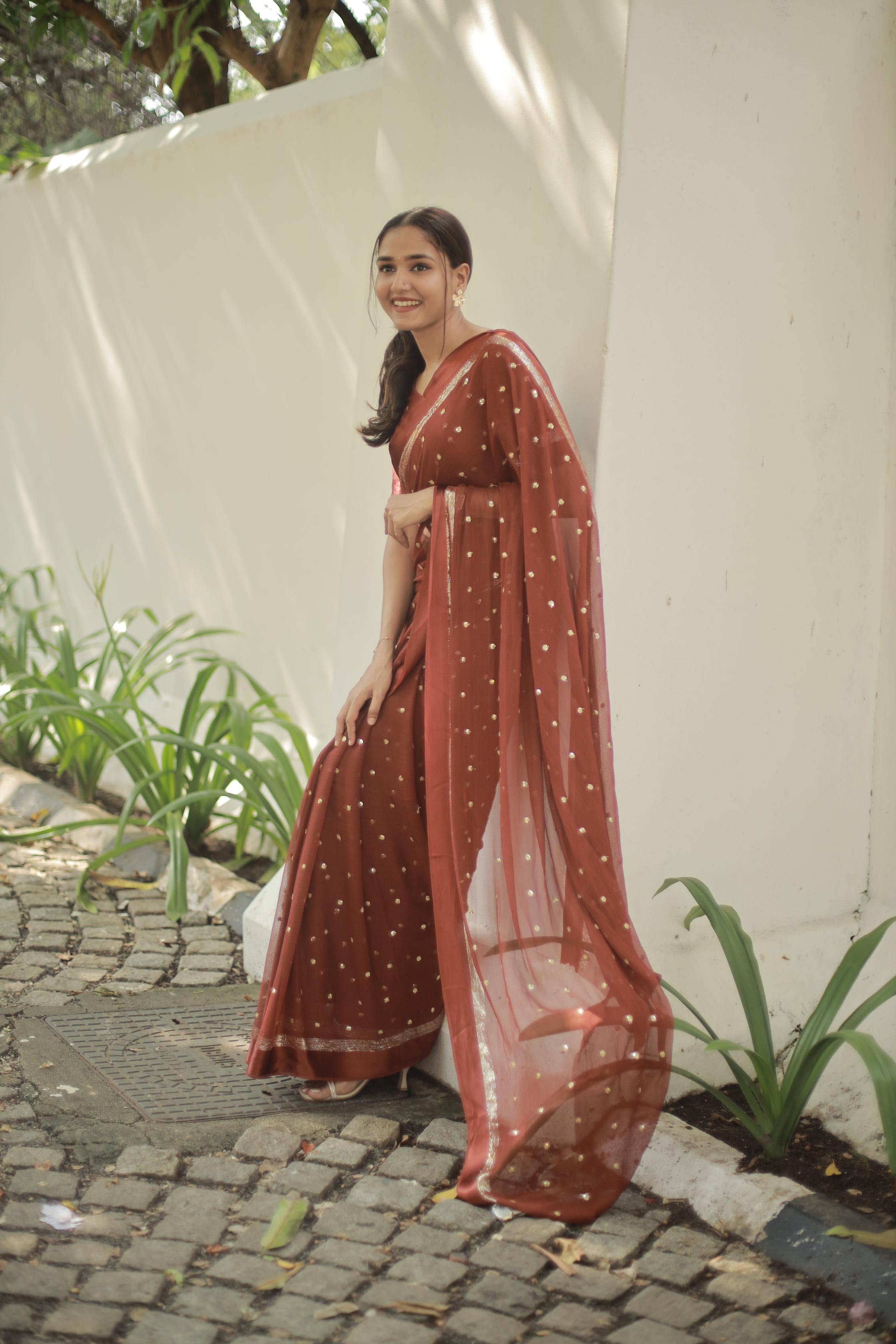 Most Trending Viral Pure Viscose Georgette Festival Rust Color Saree With Satin Border