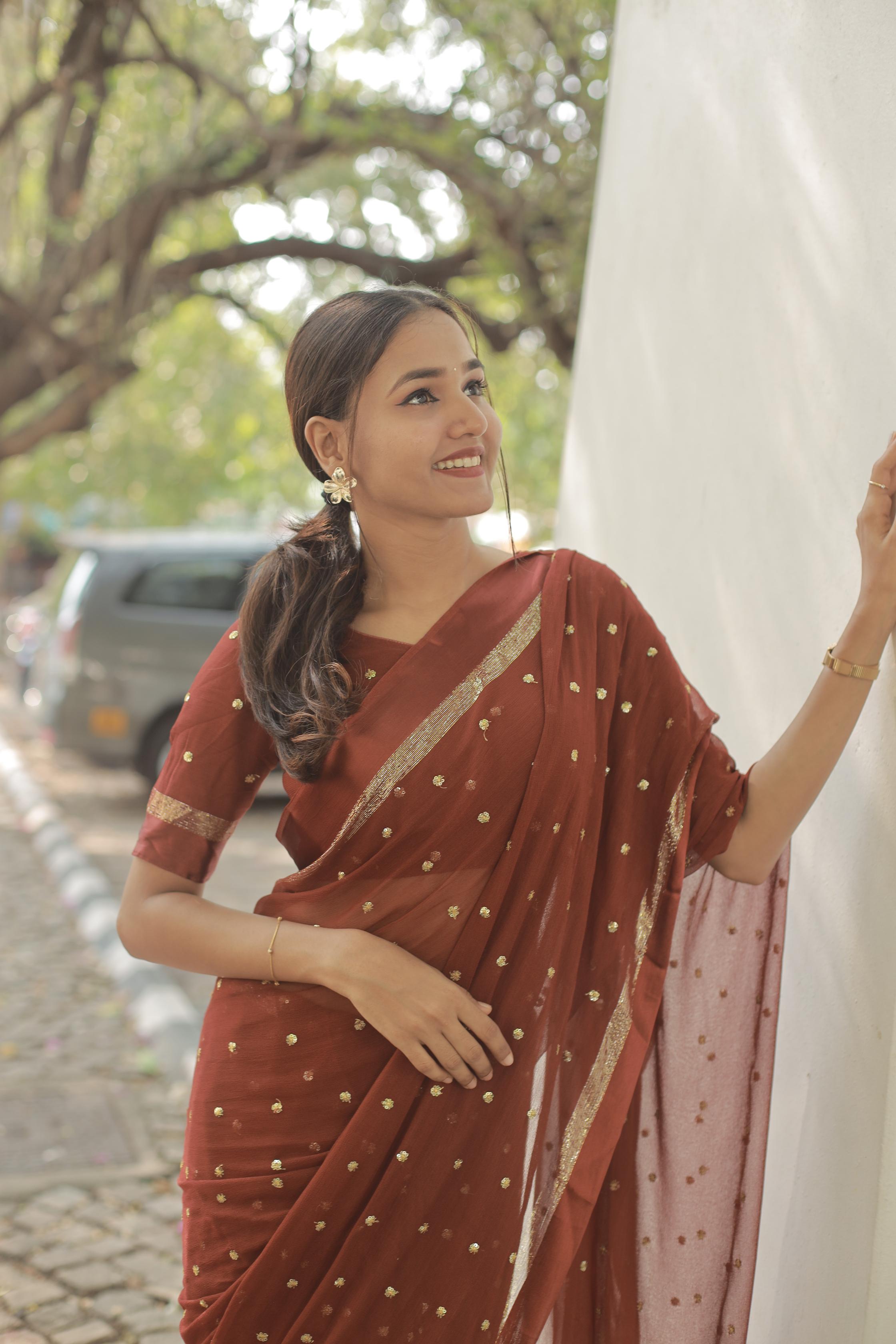 Most Trending Viral Pure Viscose Georgette Festival Rust Color Saree With Satin Border