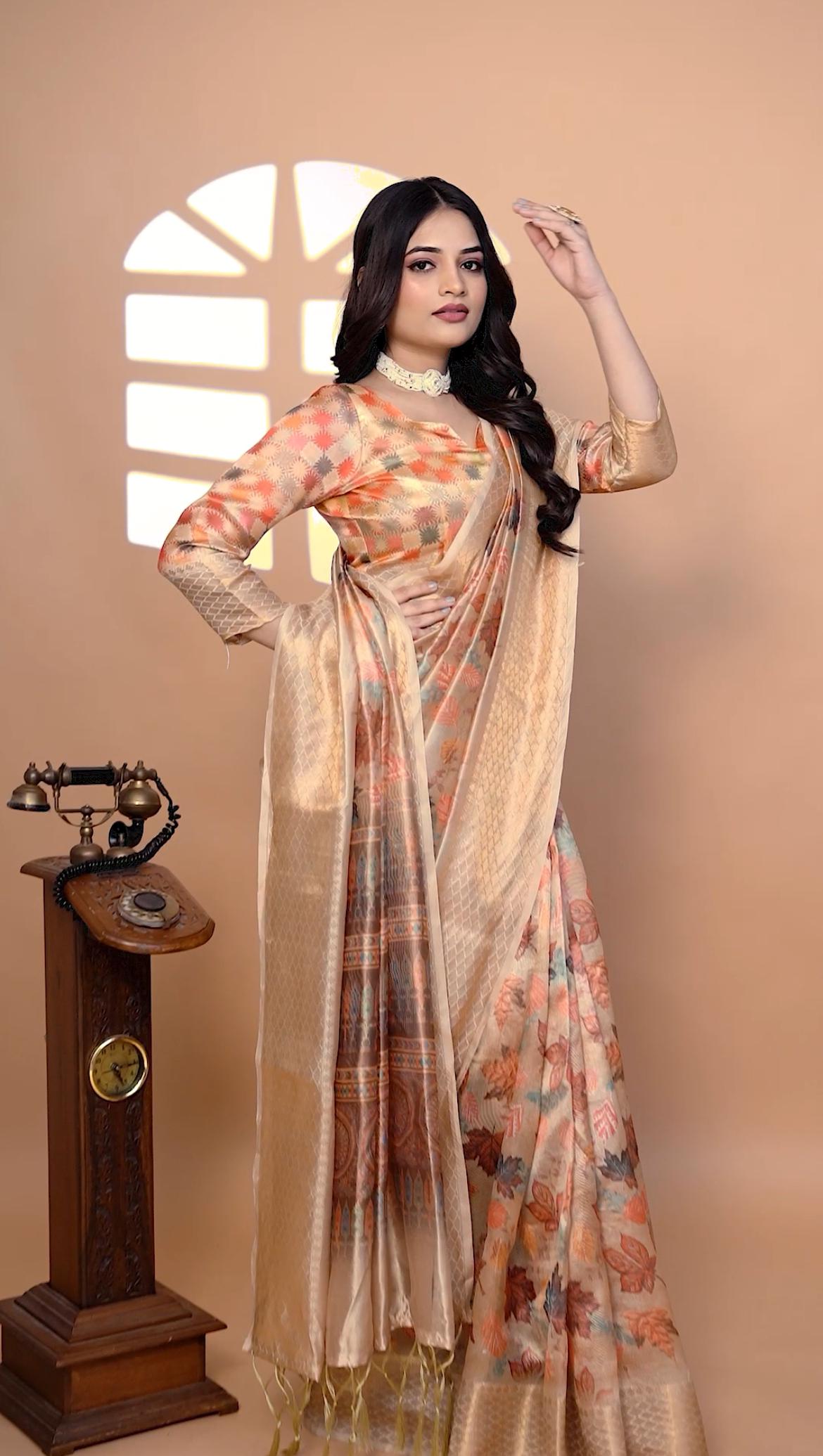 Dignified Beige Soft Silk Saree with Autumn Leaf Print & Zari border