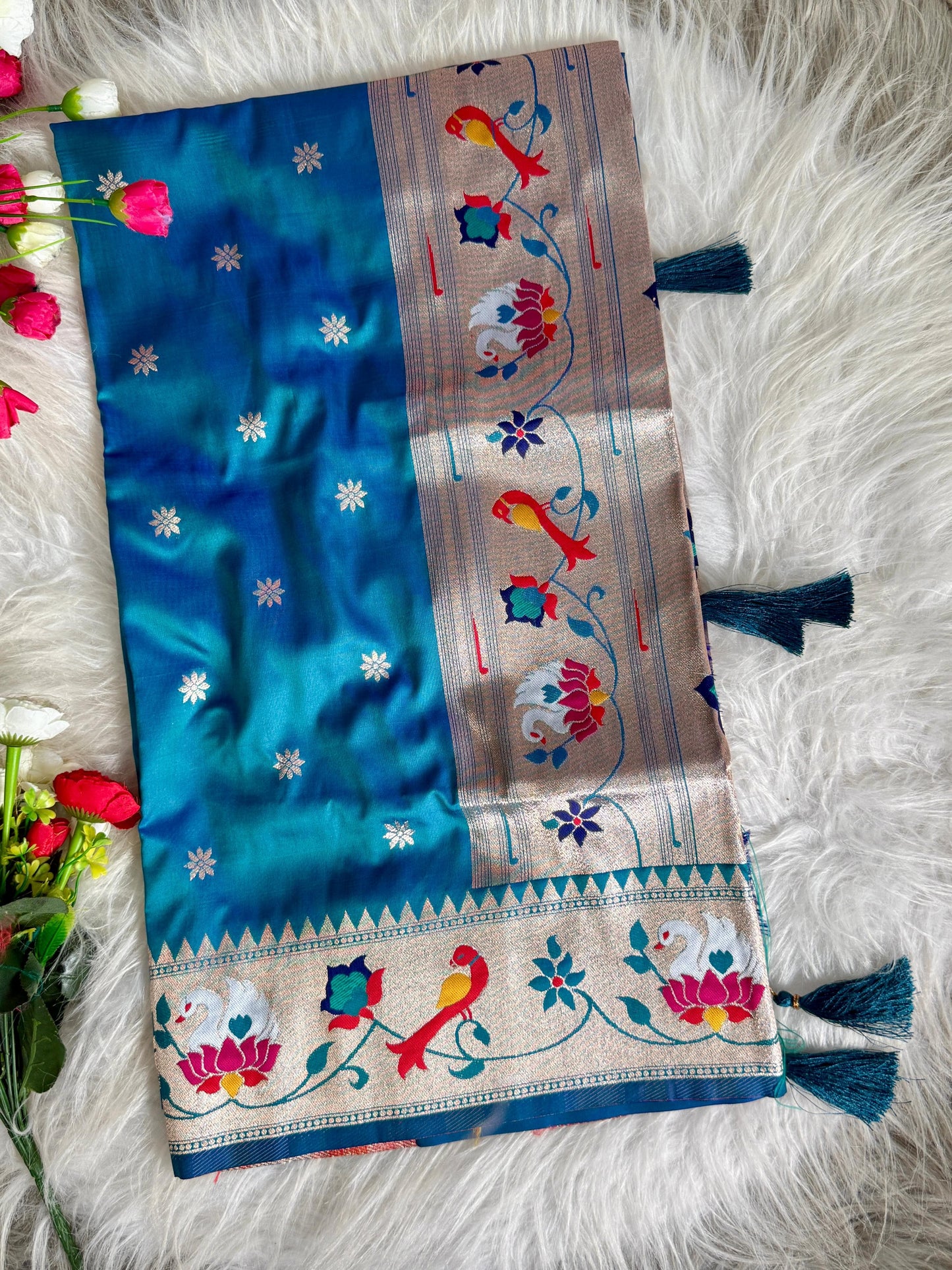 Dignified Rajhans Motifs Piathani Silk Saree with Zari Weaving