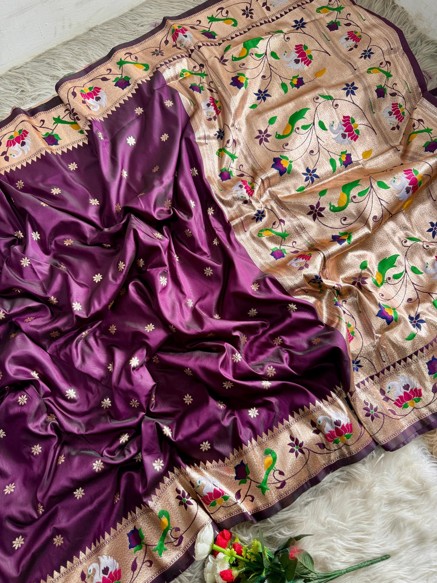 Dignified Rajhans Motifs Piathani Silk Saree with Zari Weaving