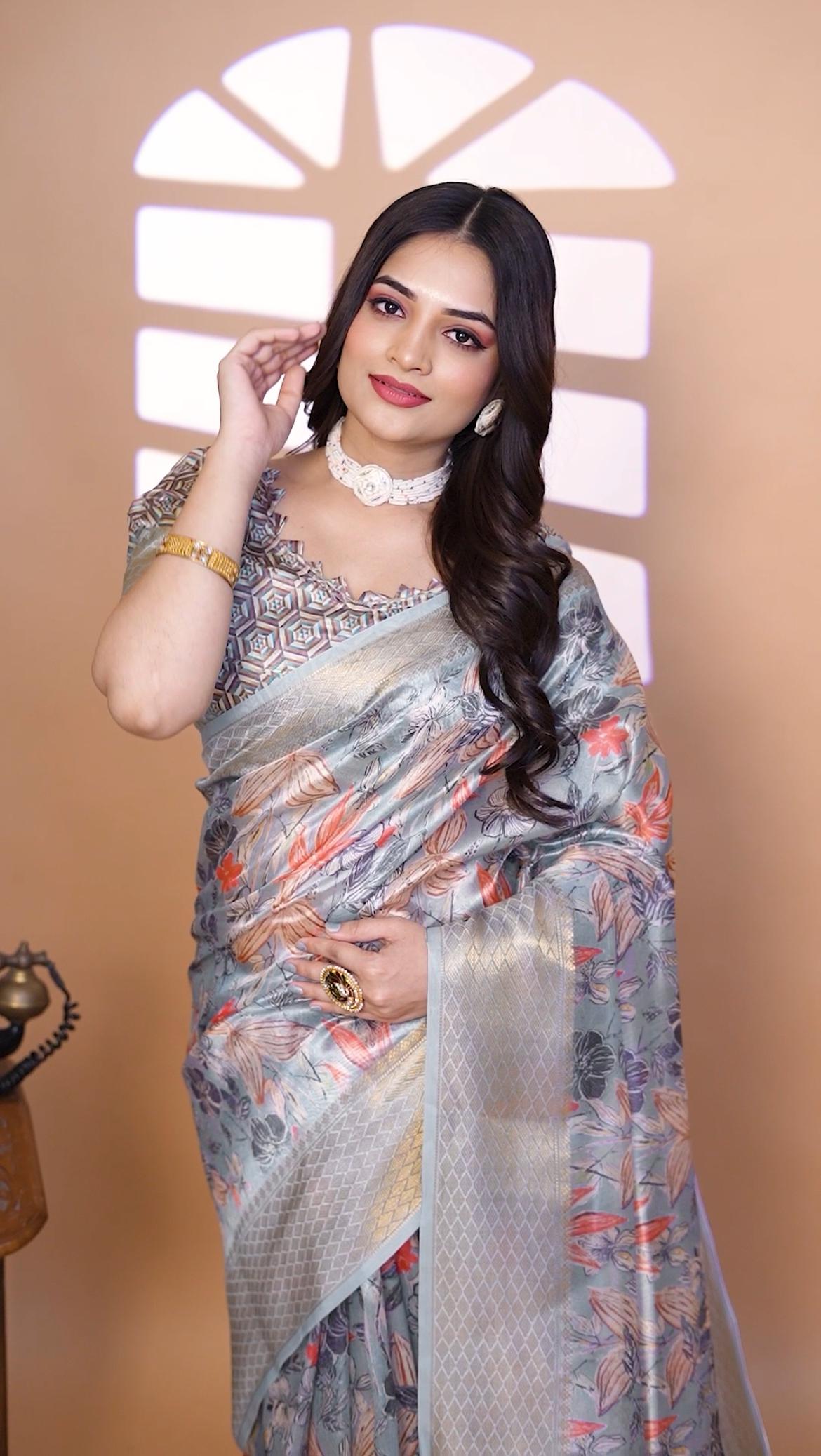 Graceful Soft Silk Saree with Floral Print And Zari Border