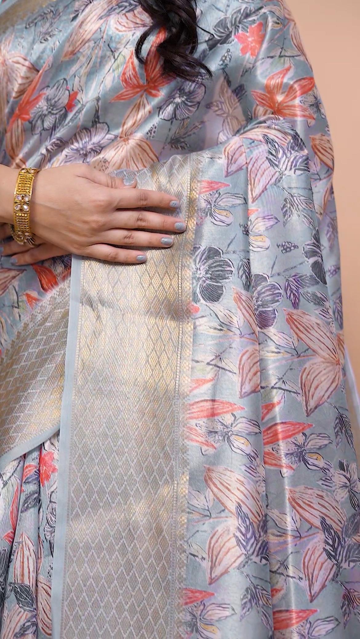Graceful Soft Silk Saree with Floral Print And Zari Border