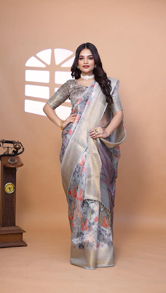 Graceful Soft Silk Saree with Floral Print And Zari Border
