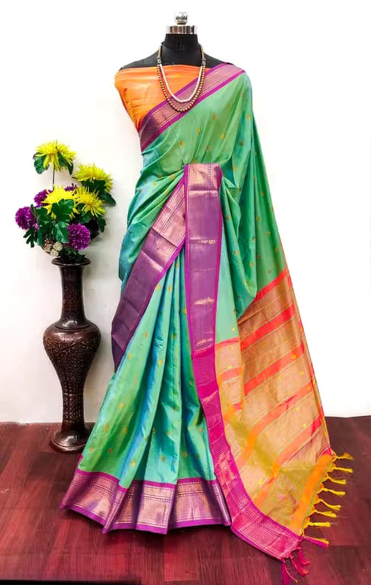 Attractive Zari Weaving Paithani Silk Saree With Tassels