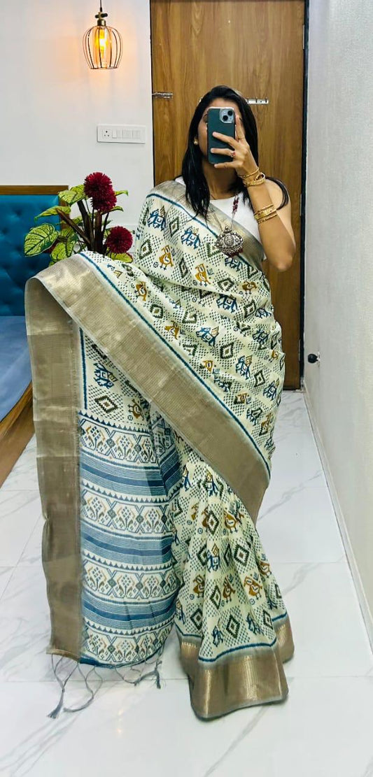 Winsome Handloom Silk Saree In  Ikkat Print With Zari Border