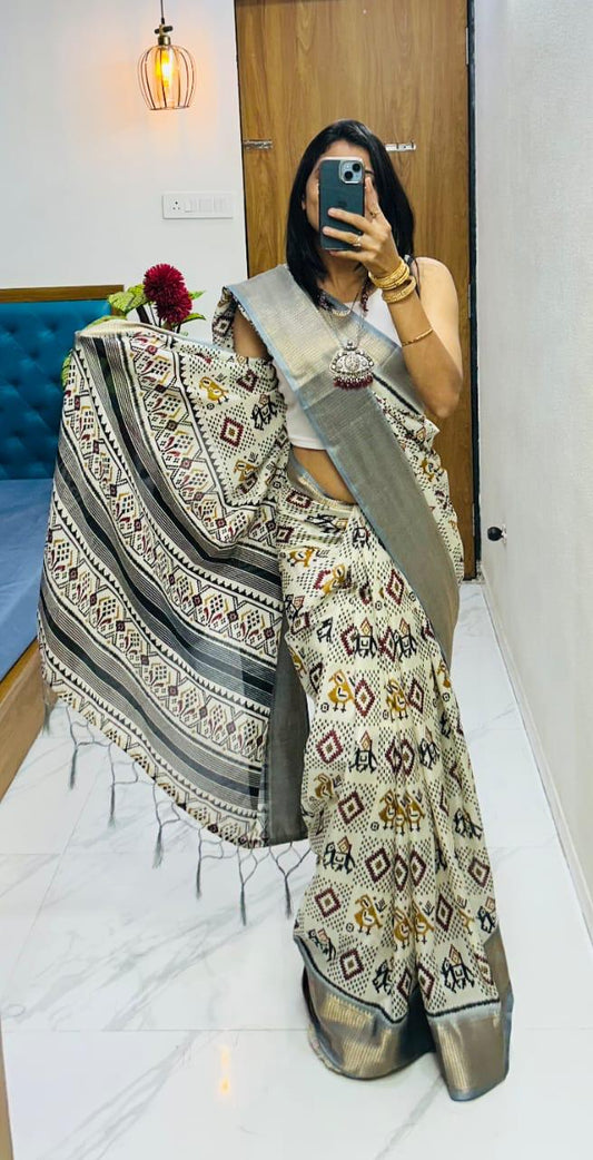 Winsome Handloom Silk Saree In  Ikkat Print With Zari Border