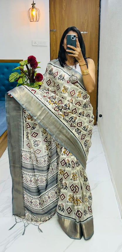Winsome Handloom Silk Saree In  Ikkat Print With Zari Border
