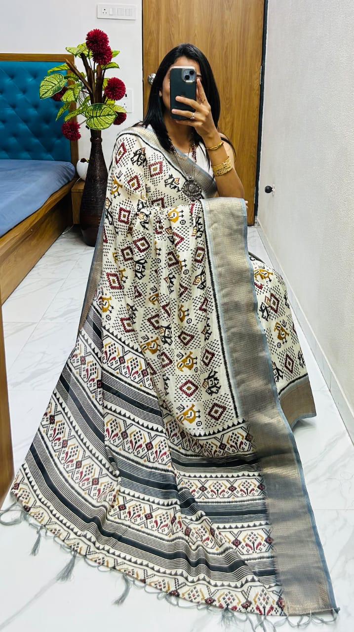 Winsome Handloom Silk Saree In  Ikkat Print With Zari Border