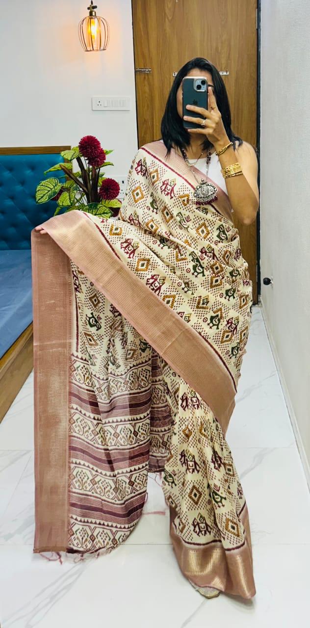 Winsome Handloom Silk Saree In  Ikkat Print With Zari Border