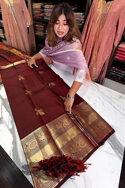 Very Alluring Wine Soft Banarasi Silk Saree With Pretty Blouse Piece